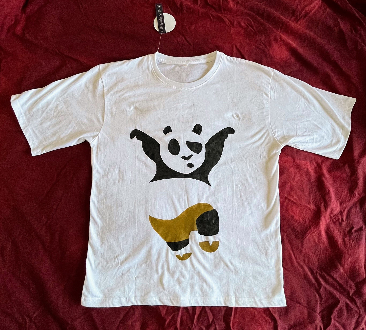 Full view of a unique hand-painted Kung Fu Panda t-shirt, featuring Po the Dragon Warrior.
